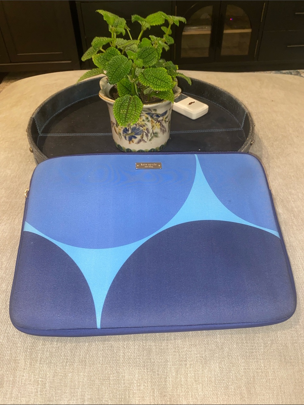 Kate Spade New York geometric blue laptop sleeve with gold-tone hardware